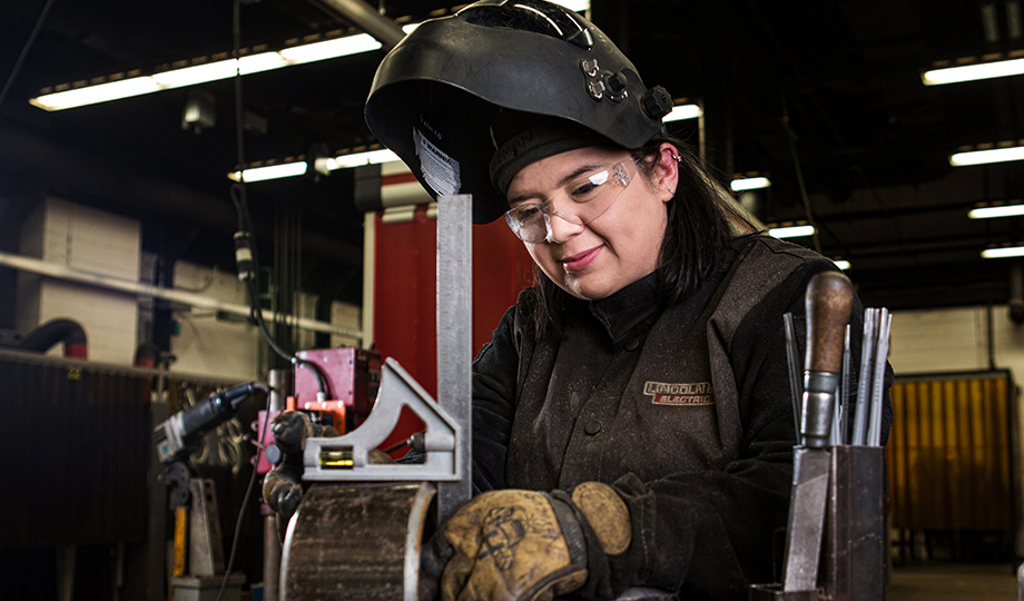 Maggie Guzman welding