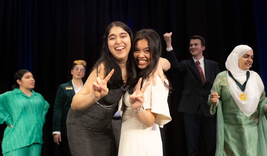 two students pose for the camera at the Student Life Awards Celebration